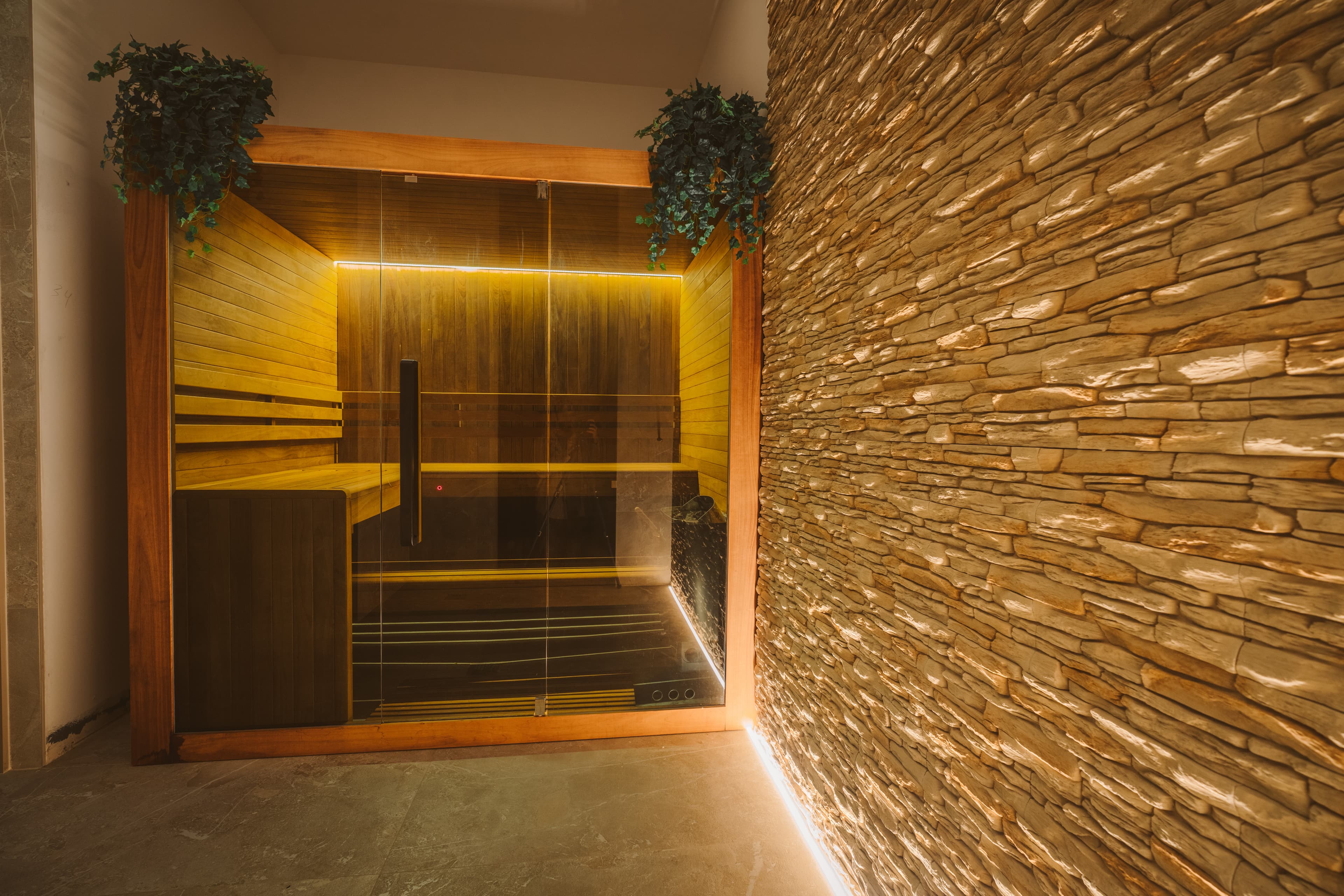 The warm, wood-panelled sauna at Studio 22